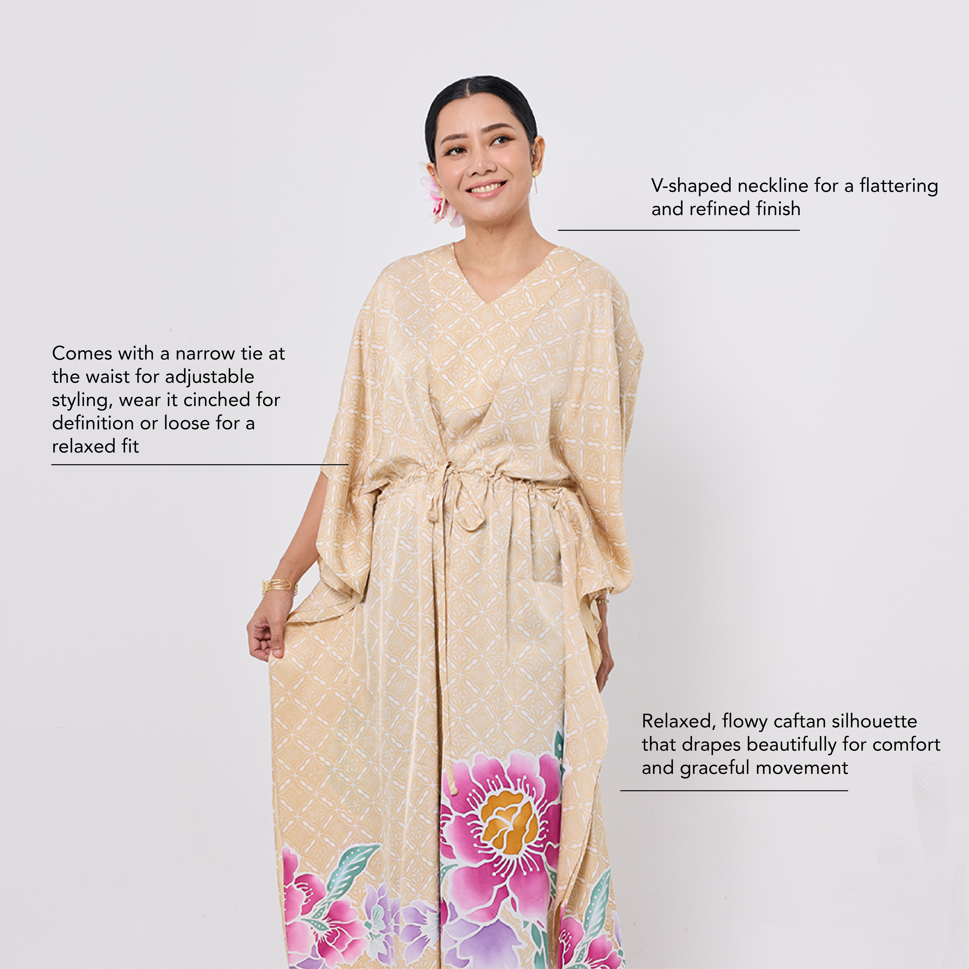 Alysya Caftan showing V neckline, adjustable waist tie and relaxed batik silhouette