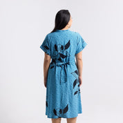 Back View of the Azure blooming lace ayaz dress worn by a model 