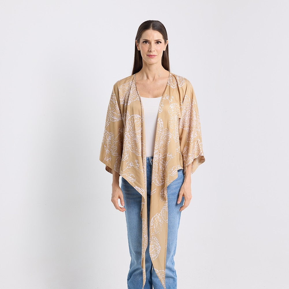 front view photo of the tan orchid tie front kimono shown being untied 