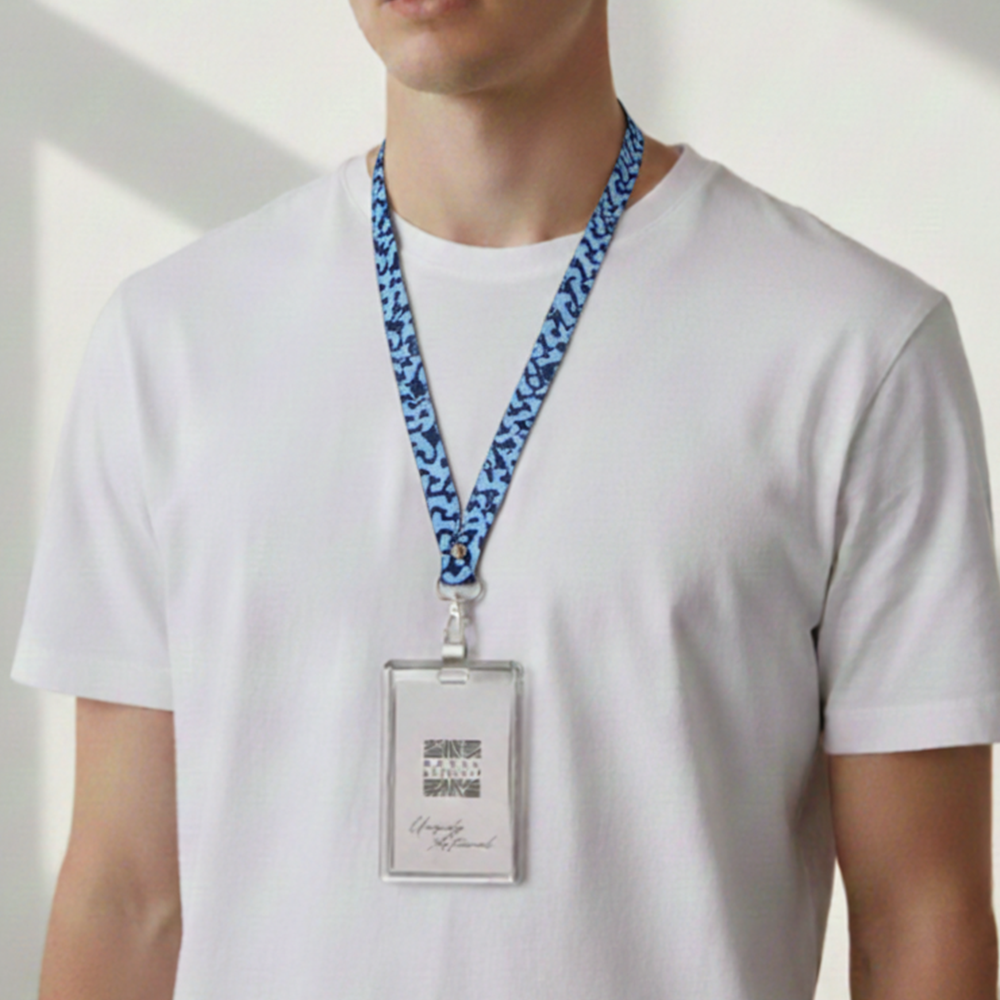 Batik Lanyard in Midnight Arabesque shown being worn by a model in a lifestyle photo