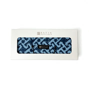Wall hooks with blue geometric pattern in a Batik Boutique box on a white background