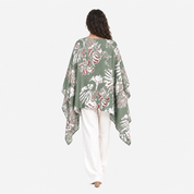 Lady wearing green batik printed scarf
