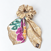 Flatlay of cream colored batik scrunchy 