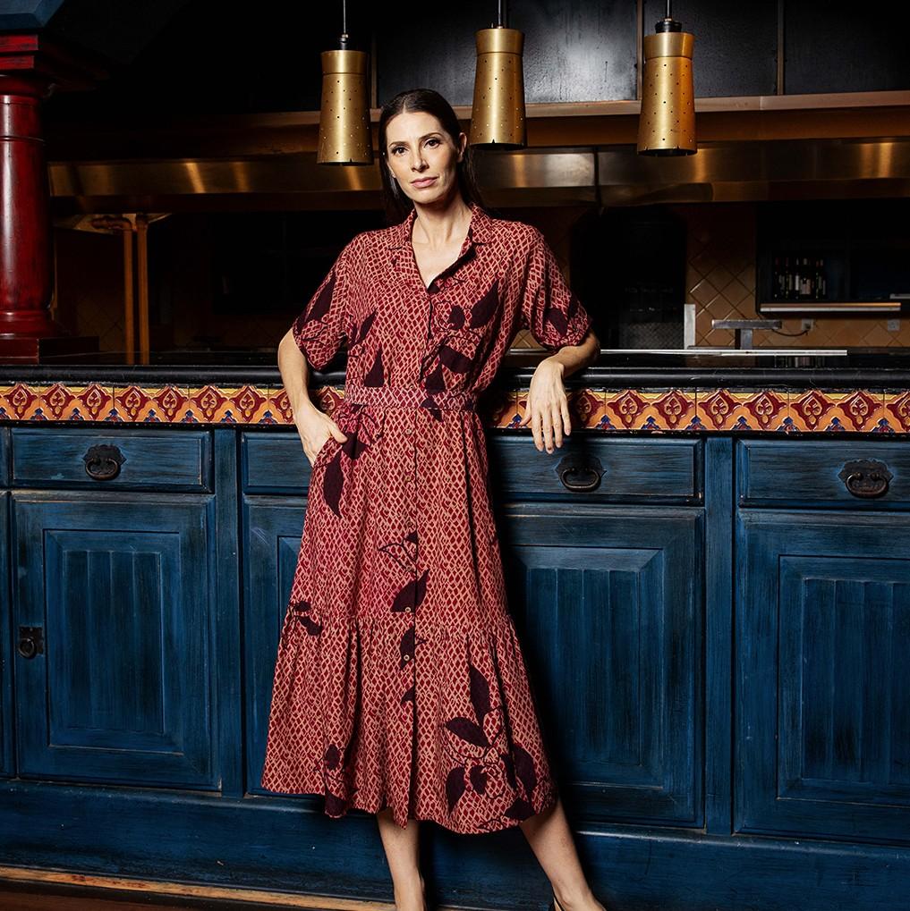 Women copper blooming lace button up dress, model showing the pocket 