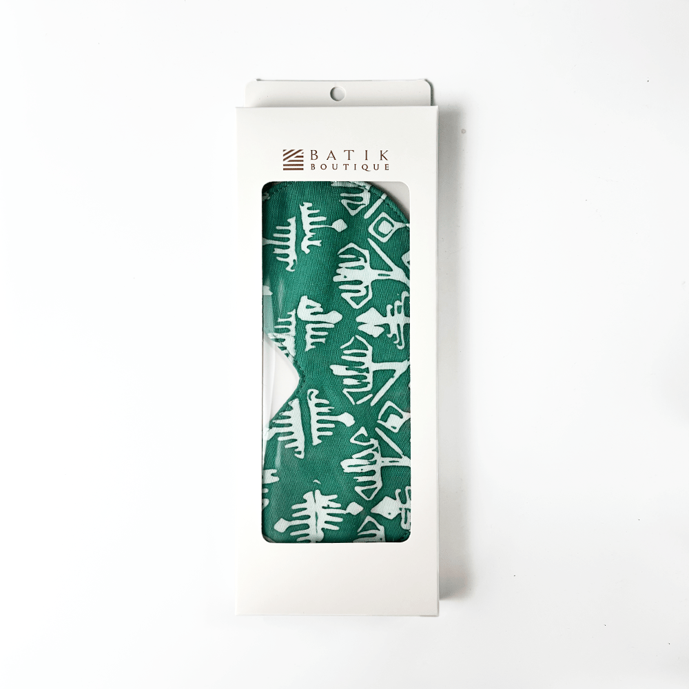 Turquoise Tikar batik eye mask packaged in Batik Boutique white box with viewing window, showcasing handcrafted Malaysian batik design.