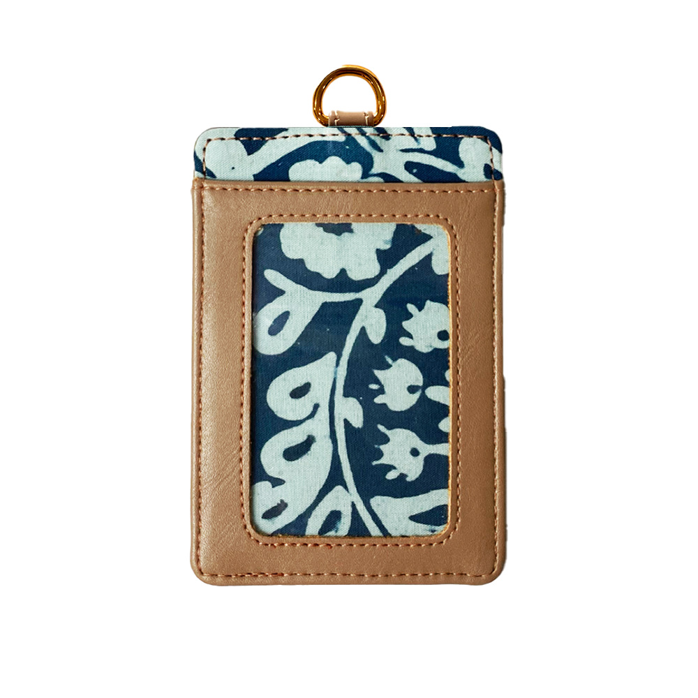 Card holder with blue floral pattern and brown border on a white background
