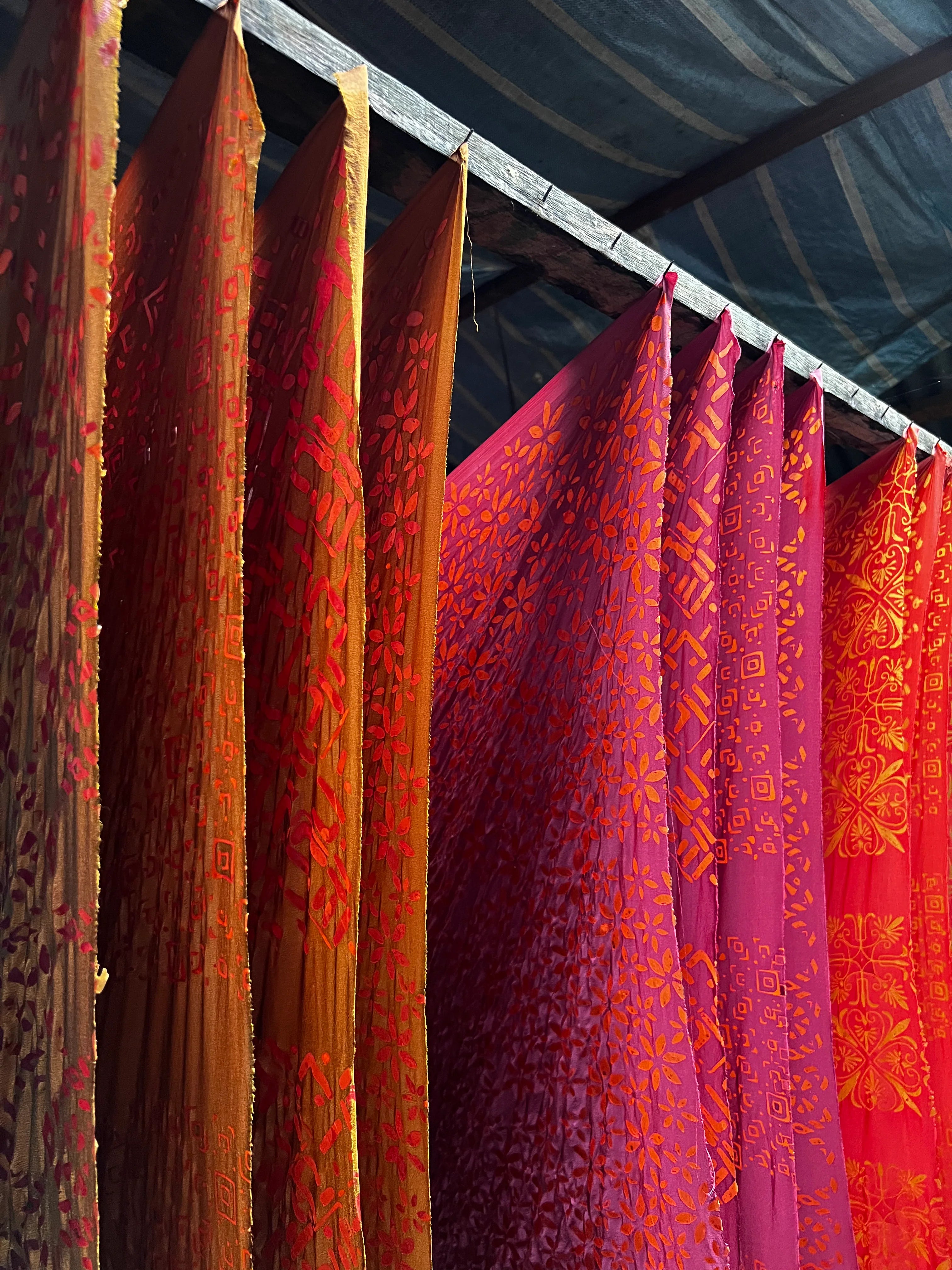 Premium batik fabric featuring intricate handcrafted patterns and vibrant colors.