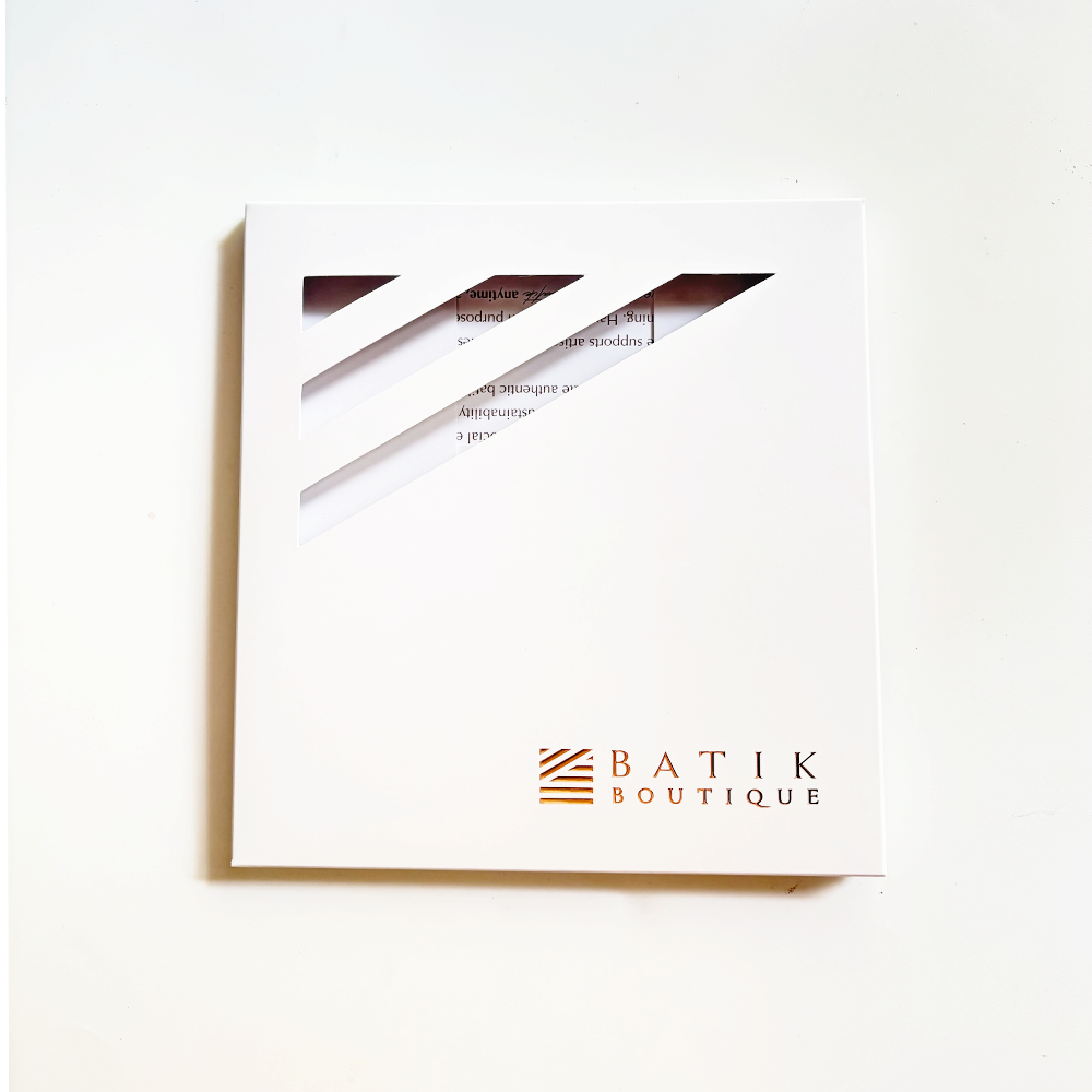 Framed artwork with 'Batik Boutique' logo on a white background