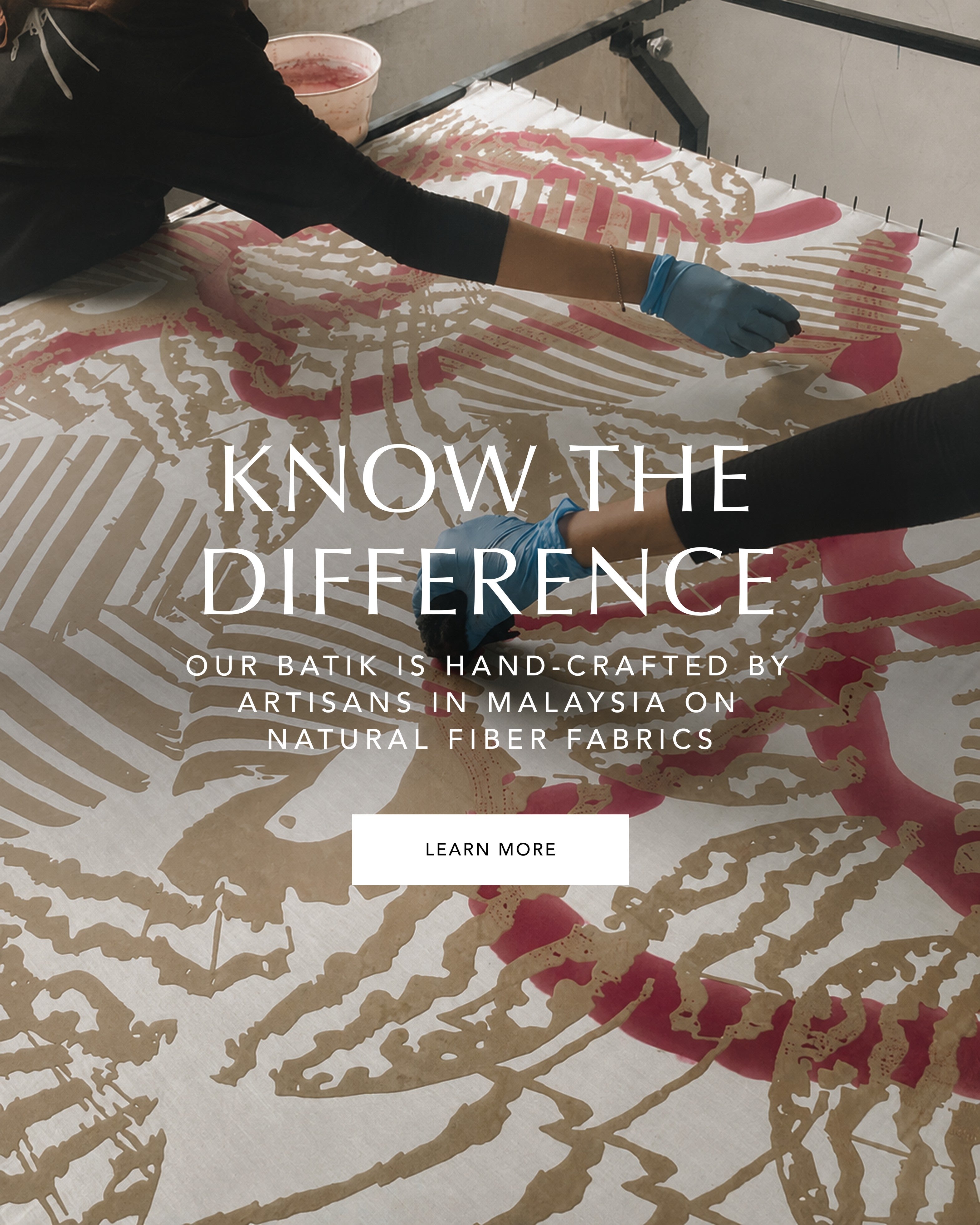 Person working on batik fabric with text about hand-crafted batik in Malaysia.