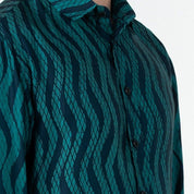 Zoom in front view of the teal snake skin