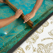 Artisan photo of the orchid print being created 