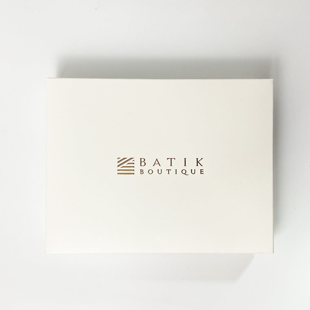 White box with 'Batik Boutique' logo on a light gray background