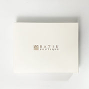 White box with 'Batik Boutique' logo on a light gray background