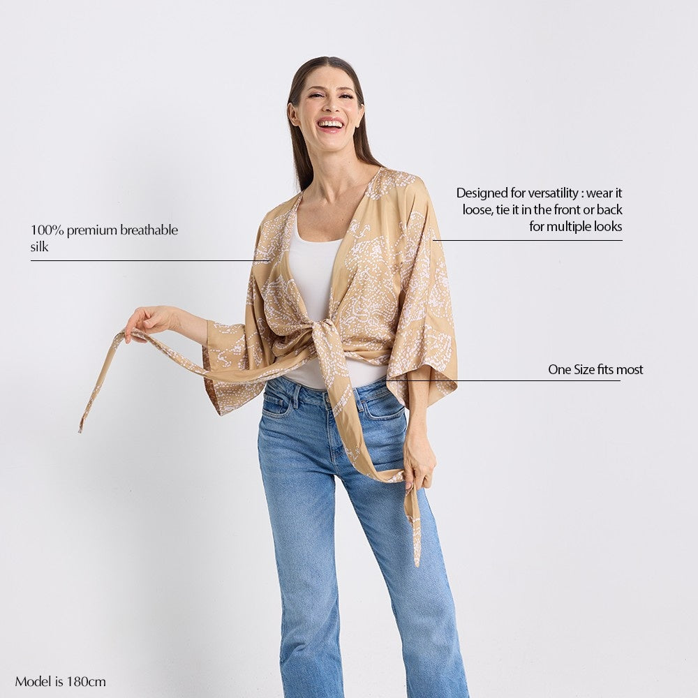 The women's tie front kimono showing the unique qualities of the product 