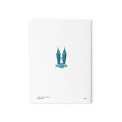 White notebook with blue illustration of a building on a white background
